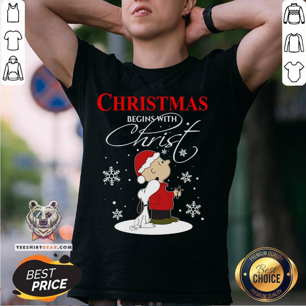 Official Snoopy And Charlie Brown Christmas Begins With Christ Shirt - Design By Teeshirtbear.com