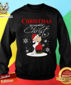 Official Snoopy And Charlie Brown Christmas Begins With Christ Sweatshirt - Design By Teeshirtbear.com