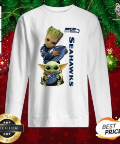 Hot Baby Groot And Baby Yoda Hug Seahawks Sweatshirt - Design By Teeshirtbear.com