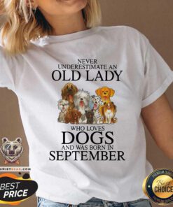 Never Underestimate A Sep Lady Who Loves Dogs V-neck