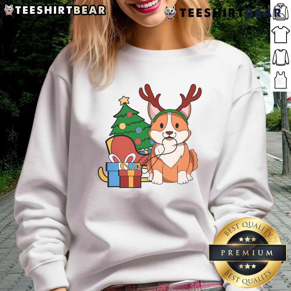 Cute Corgi Dog in Santa hat and reindeer antlers wearing a Christmas gift sweatshirt, perfect for holiday cheer.