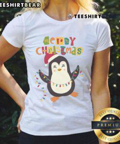 Cute penguin wearing a Santa hat on a Merry Christmas ladies tee, perfect for festive holiday celebrations.