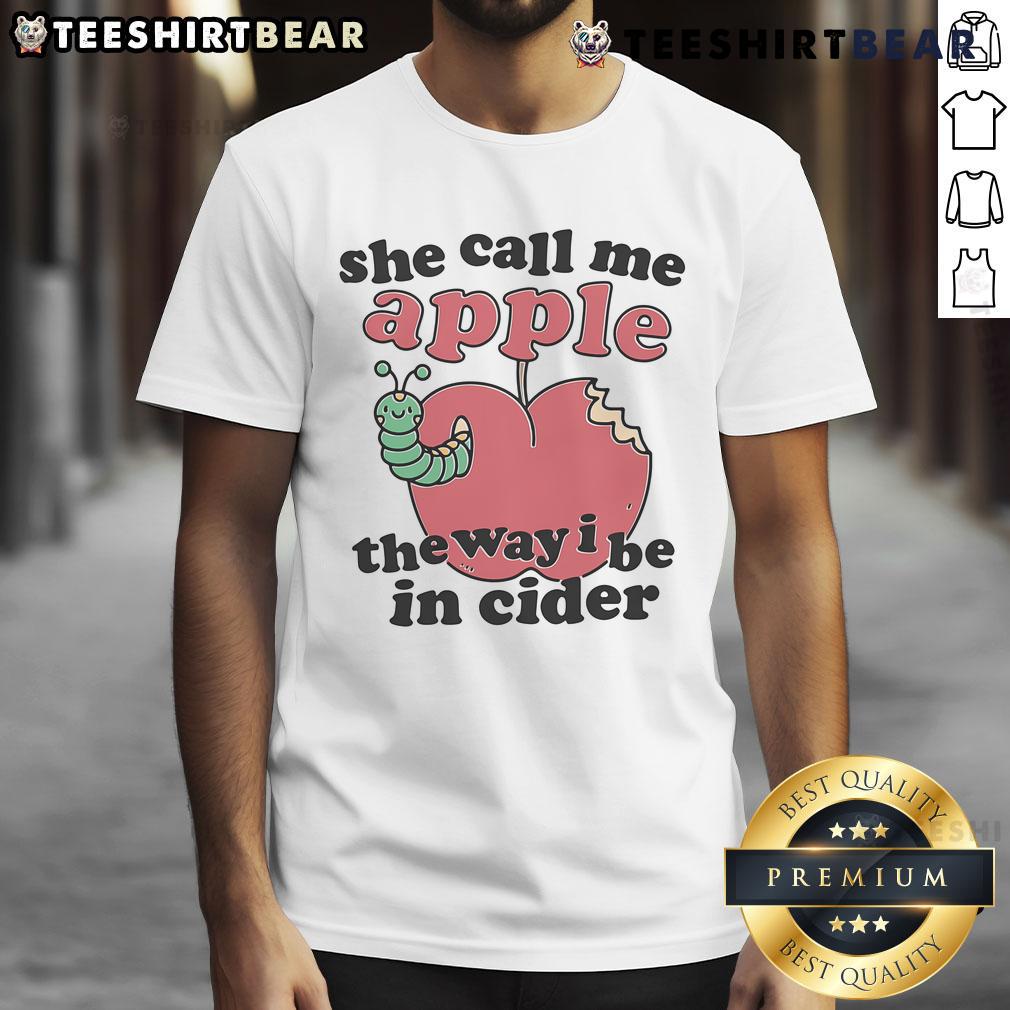 Cute 'She Call Me Apple The Way I Be In Cider' T-shirt design featuring a fun apple graphic and playful typography.