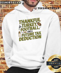 Funny Thanksgiving pregnancy announcement hoodie featuring playful graphics and festive colors, ideal for holiday celebrations.