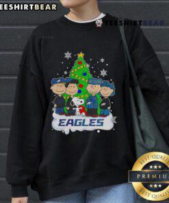 Alt Text: Good Peanuts characters on a Philadelphia Eagles Christmas Tree sweatshirt, perfect for holiday sports fans.