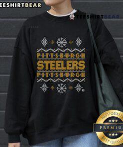 Cozy Pittsburgh Steelers holiday sweatshirt featuring team logo, perfect for fans celebrating the season in style.