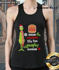 Good Santa and Grinch burger King inside a cozy Christmas tank top, enjoying the festive spirit away from the crowd.