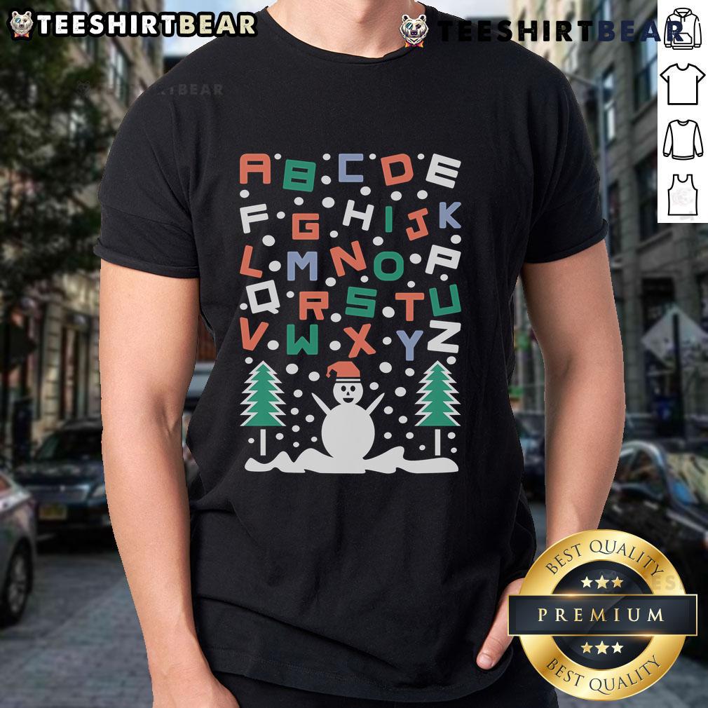 Festive 'Good Snowman Alphabet Christmas T-Shirt' featuring a cheerful snowman and playful letters for holiday spirit.
