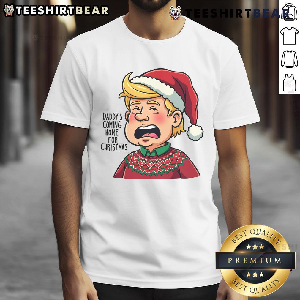 Alt Text: Good Trump Santa Daddy's Coming Home for Christmas T-Shirt featuring festive design and patriotic colors.