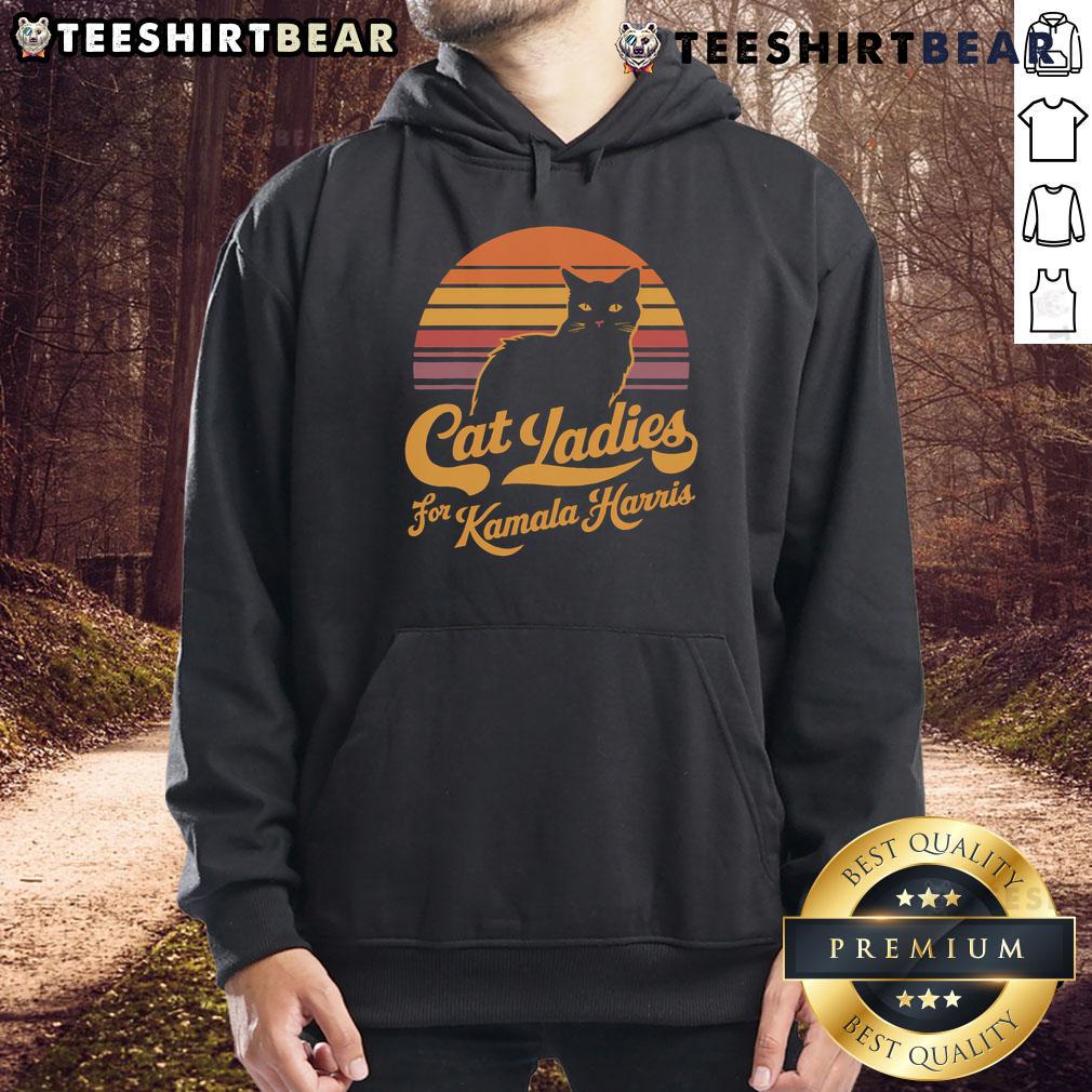 Hot cat lady wearing a vintage sunset hoodie supporting Kamala Harris, showcasing a trendy political fashion statement.
