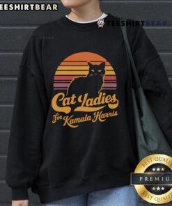 Alt Text: Vintage sunset sweatshirt featuring a hot cat lady design supporting Kamala Harris.