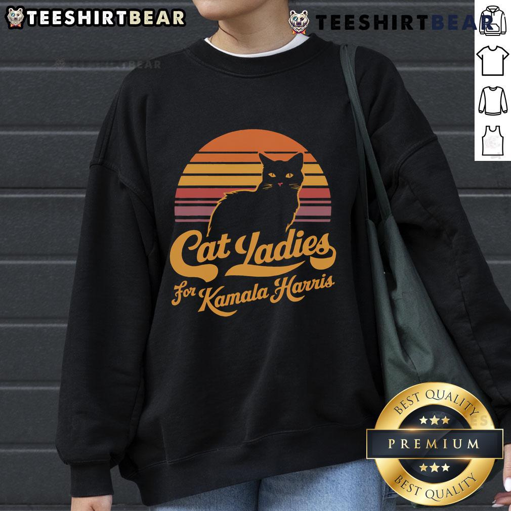 Alt Text: Vintage sunset sweatshirt featuring a hot cat lady design supporting Kamala Harris.