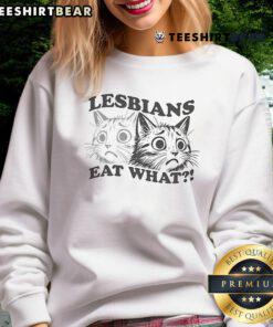Hot Lesbians Eat What Cat Sweatshirt featuring a playful design with vibrant colors and a cozy fit for casual wear.