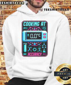 Person wearing a Nice Cooking at Accuracy Molecular Gastronomy hoodie, showcasing culinary creativity and modern cooking style.