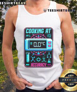 Person wearing a 'Nice Cooking' tank top, showcasing molecular gastronomy techniques in a modern kitchen setting.