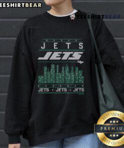 Cozy New York Jets holiday sweatshirt featuring team colors and logo, perfect for fans celebrating the festive season.