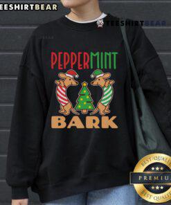 Festive Dachshund dog in a 'Nice Peppermint Bark' Christmas sweatshirt, perfect for holiday cheer and dog lovers.