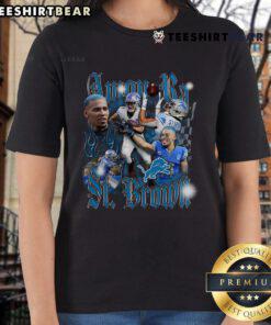 Official Amon-Ra St. Brown Detroit Lions Ladies Tee showcasing fan support for the notorious player in vibrant colors.