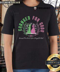 Alt Text: Official Changed For Good Witch Pink and Green Shiz University Ladies Tee showcasing stylish design for fans.