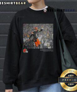 Alt Text: Jameis Winston wearing a Cleveland Browns NFL sweatshirt featuring Flash Features design for Week 12 game.