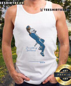 Jameson Williams celebrates touchdown in NFL wearing an official tank top, showcasing team spirit and athletic style.