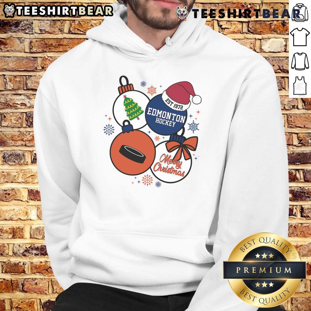 Official Merry Christmas Edmonton Hockey hoodie established 1972, featuring festive design and team colors for fans.