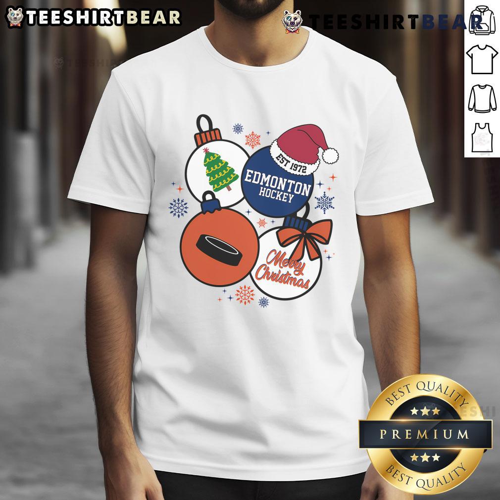 Official Merry Christmas Edmonton Hockey Est 1972 T-Shirt featuring festive design and team colors for hockey fans.