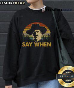 Official Say When Cowboy Sunset Vintage Sweatshirt featuring a rustic sunset design and cozy fit for casual wear.
