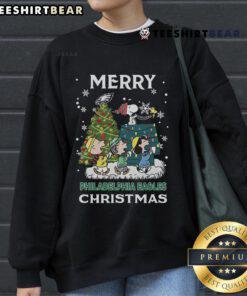 Official Snoopy and Friends Philadelphia Eagles Merry Christmas 2024 Sweatshirt featuring festive designs and team colors.
