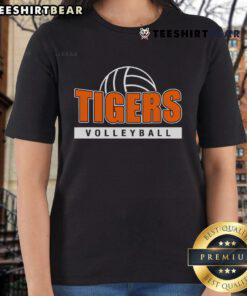 Official Tigers volleyball team photo featuring a tiger mascot and players in ladies' tees, showcasing team spirit.