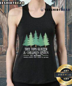Children wearing 'Nothing Christmas' tank tops enjoy the glistening tree tops during a festive holiday celebration.