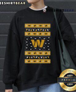 Official Washington Commanders holiday Christmas sweatshirt featuring team logo and festive design for fans.