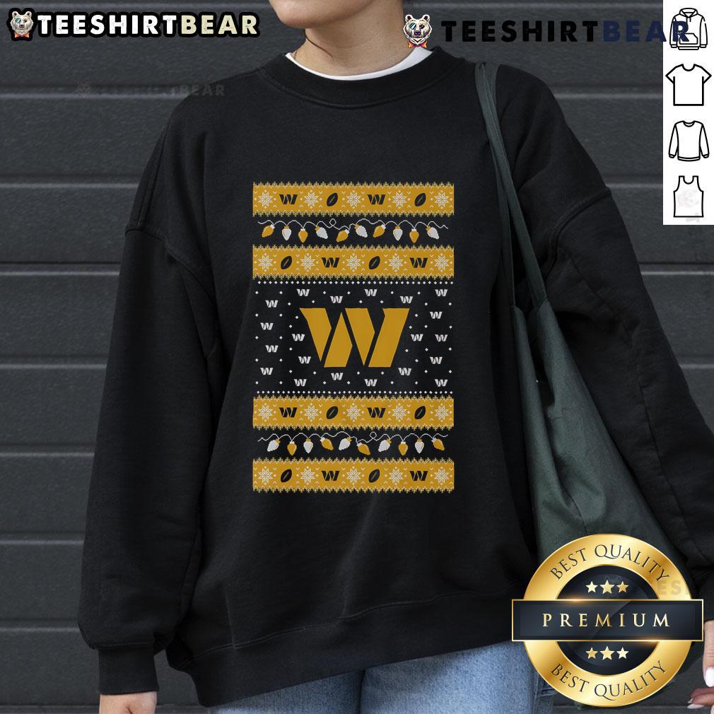 Official Washington Commanders holiday Christmas sweatshirt featuring team logo and festive design for fans.