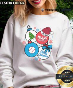 Premium Merry Christmas Miami Baseball Est 1993 Sweatshirt design featuring festive graphics and cozy style.
