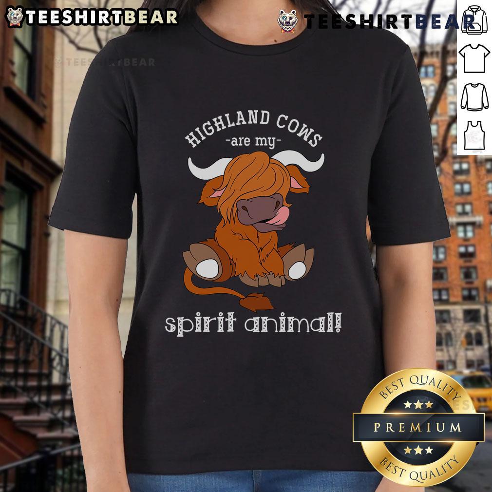 Scottish Highland cow graphic on a ladies tee with the phrase 'Top Highland Cows Are My Spirit Animal'.