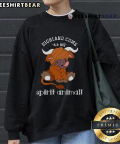 Cozy Scottish Highland cow sweatshirt featuring a top Highland cow design, perfect for fans of these gentle spirit animals.