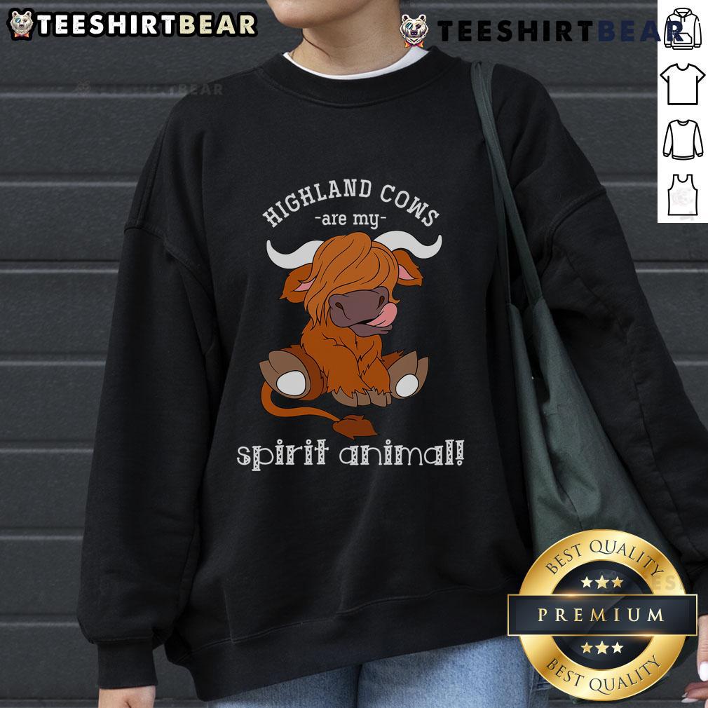 Cozy Scottish Highland cow sweatshirt featuring a top Highland cow design, perfect for fans of these gentle spirit animals.
