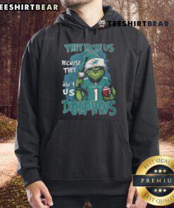 Miami Dolphins hoodie featuring 'They Hate Us Because They Ain't Us' slogan, perfect for fans showing team pride.