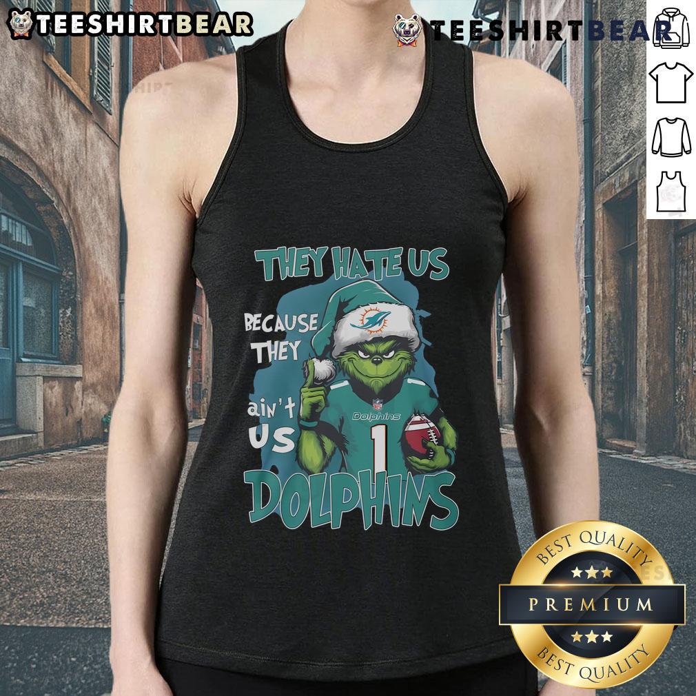 Miami Dolphins tank top featuring 'They Hate Us Because They Ain't Us' slogan, perfect for fans supporting their team.