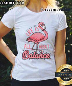 Cute flamingo graphic on a ladies tee with 'Life Is All About Balance' slogan, perfect for flamingo lovers.