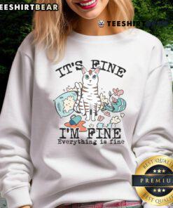 Adorable cat sweatshirt reading 'It's Fine, I'm Fine, Everything is Fine' perfect for cat lovers and cozy outfits.