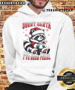 Cute Sorry Santa I've Been Feral Funny Raccoon Christmas Hoodie design featuring a playful raccoon in festive attire.