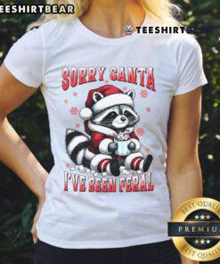 Funny raccoon Christmas tee for ladies, featuring 'Cute Sorry Santa I've Been Feral' design, perfect for festive humor.