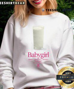 Adorable baby girl in a funny milk sweatshirt, showcasing a playful design perfect for casual outings and cozy days.