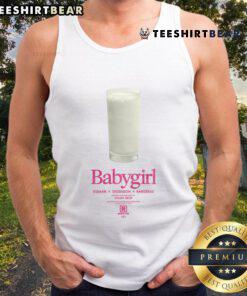 Adorable baby girl wearing a funny milk-themed tank top, perfect for playful summer outfits and cute photo opportunities.