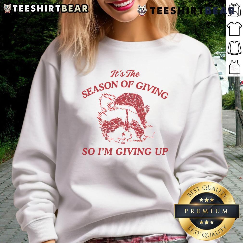 Funny Dishonorable Mentions sweatshirt featuring a raccoon design, perfect for the season of giving.
