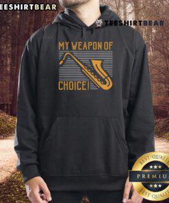 Funny Sax Saxophone hoodie featuring 'My Weapon of Choice' design, perfect for music lovers and saxophone enthusiasts.