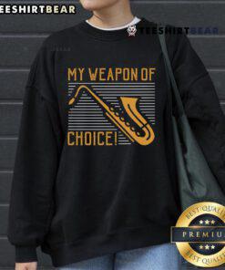 Alt Text: Funny Saxophone sweatshirt with 'My Weapon of Choice' text, perfect for music lovers and sax enthusiasts.