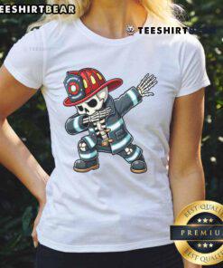 Funny skeleton firefighter dabbing in a Halloween costume ladies' tee, perfect for spooky celebrations and festive outfits.