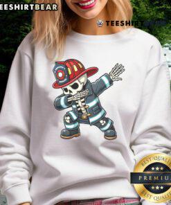Funny skeleton firefighter dabbing in Halloween costume sweatshirt, perfect for festive celebrations and spooky fun!